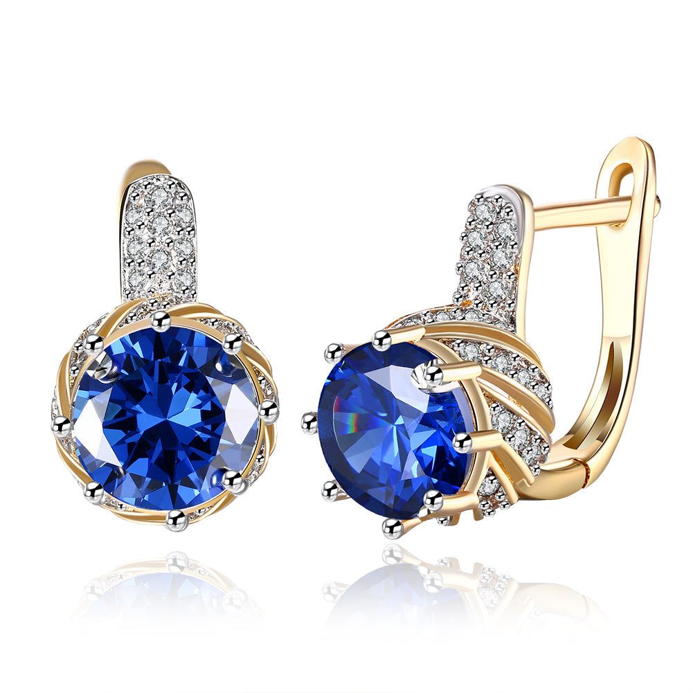 Elegant Vienna 1.00 Ct Sapphire Round Cut Huggie Earring in 18K Gold Plated, showcasing a brilliant sapphire set in a gold-plated huggie design.